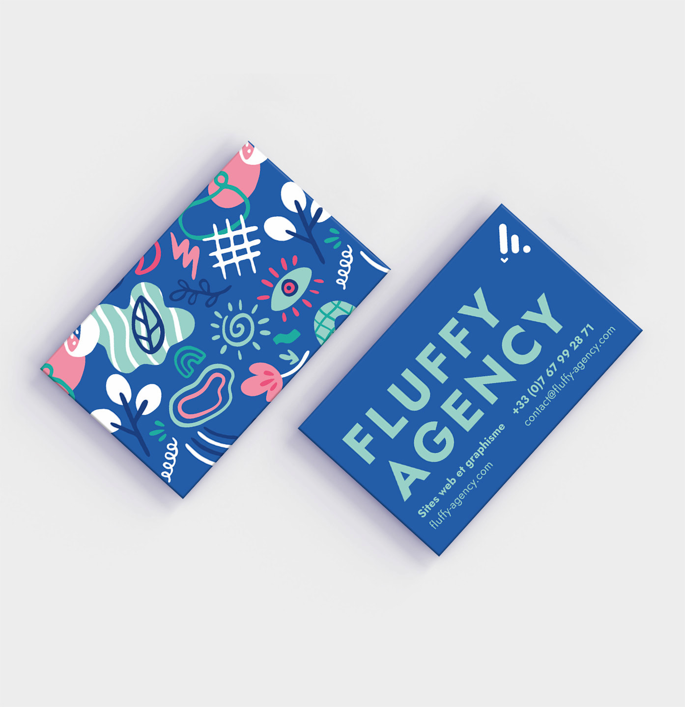 La création graphique des cartes de visite de Fluffy Agency